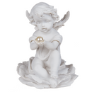 Sitzender Engel mit Perle auf Blume,
