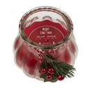 Kerze im Glas mit Weihnachts-Dekoration,
