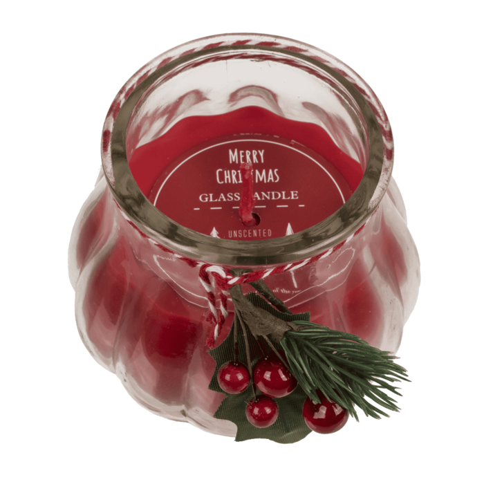 Kerze im Glas mit Weihnachts-Dekoration,