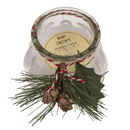 Kerze im Glas mit Weihnachts-Dekoration,
