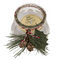 Kerze im Glas mit Weihnachts-Dekoration,