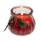 Kerze im Glas mit Weihnachts-Dekoration,