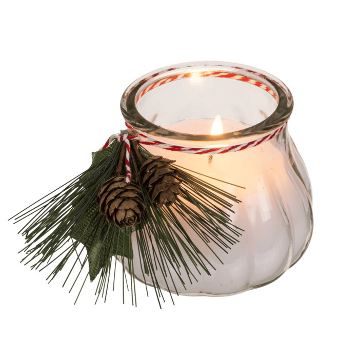 Kerze im Glas mit Weihnachts-Dekoration,