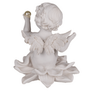 Sitzender Engel mit Perle auf Blume,