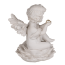 Sitzender Engel mit Perle auf Blume,