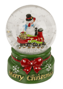 Schneekugel, Weihnachtsfigur, auf rotem & grünem